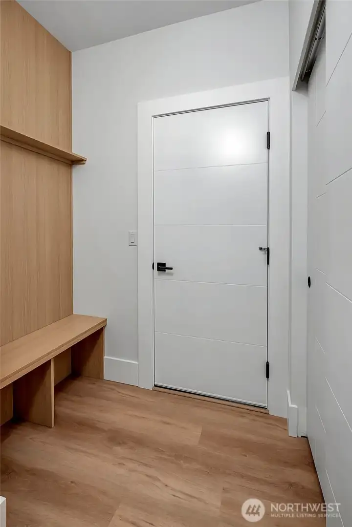 Mudroom by garage (photo of similar home in separate community)