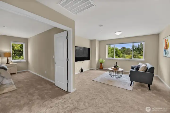 New carpeting and awesome bonus space upstairs. Open doors lead to primary bedroom