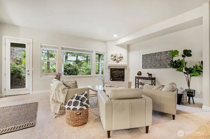 Living room is open style living and has access to large covered deck area.