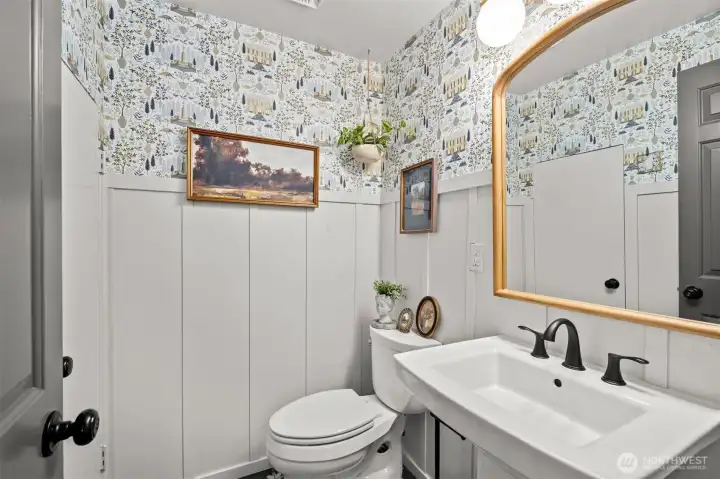 One of the most charming powder rooms you’ll see, filled with unique character and charm.