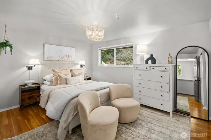 Generous primary bedroom offering the possibility to expand the primary bathroom above the garage—imagine creating your dream retreat.