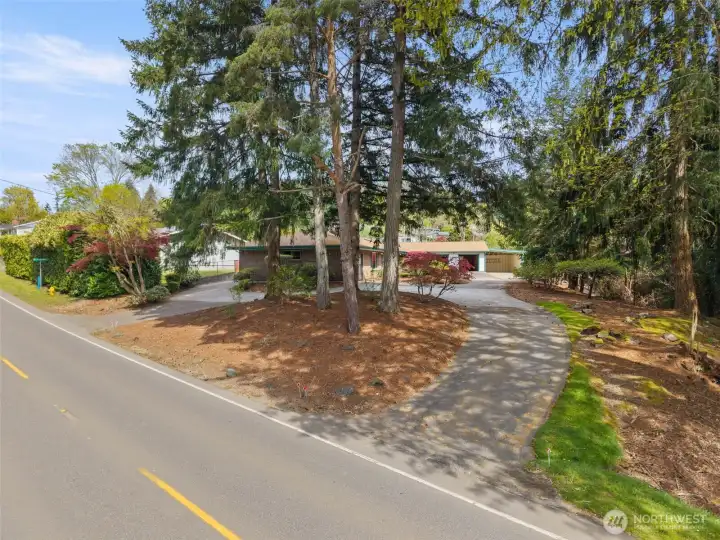 Tucked just off Trenton Avenue, this inviting property welcomes you with a paved circular driveway and 2,493 square feet of one-level living. With flexible bonus space that could work for your home-based business or additional living quarters, it offers the kind of opportunity that's hard to find!