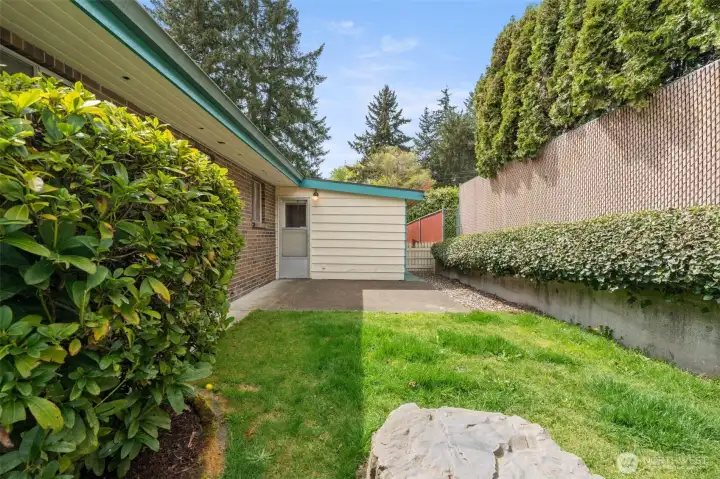 Looking back toward the east-facing door of the enclosed patio, you can see how easily this space connects indoor comfort with the outdoors.