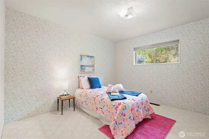 This is the third bedroom, a fresh and welcoming space that will be easy to settle into.