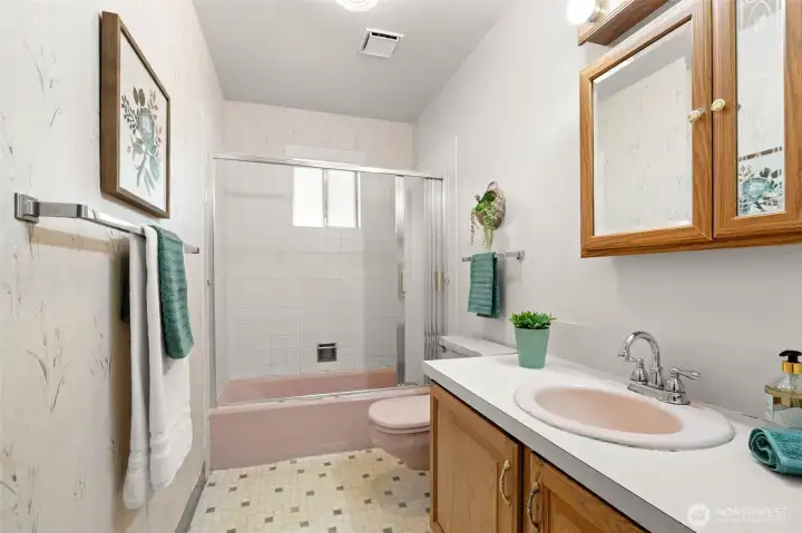 This classic main hall bath doesn't reflect today’s design trends, but it’s a classic! It's also clean and functional, while you think about updates you may want to do.