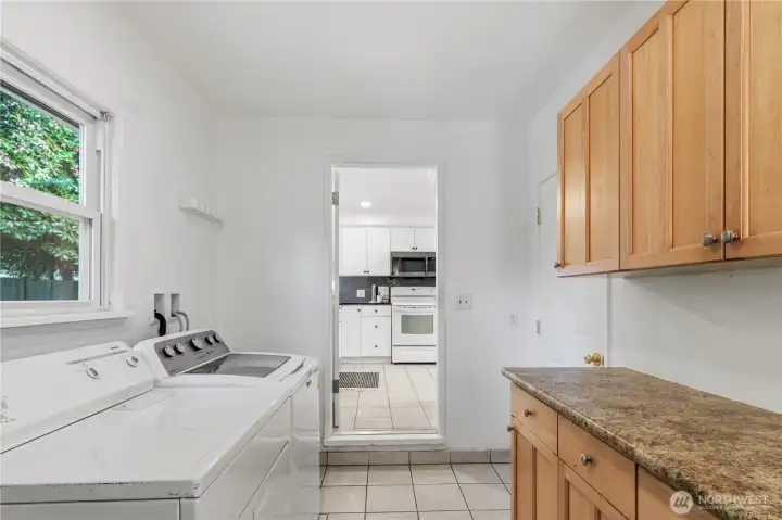 Dedicated laundry room with tons of storage