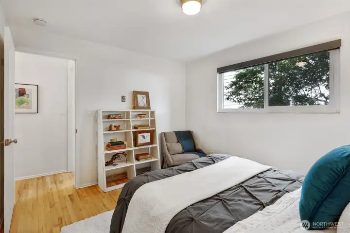 The bedroom is located back off the street for peaceful nights.