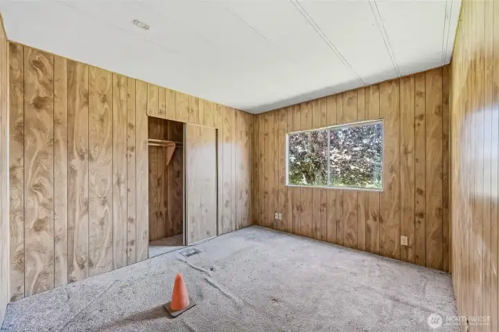First bedroom. *See the cone? There is a hole in the floor beneath it. Please use caution and do not step there.