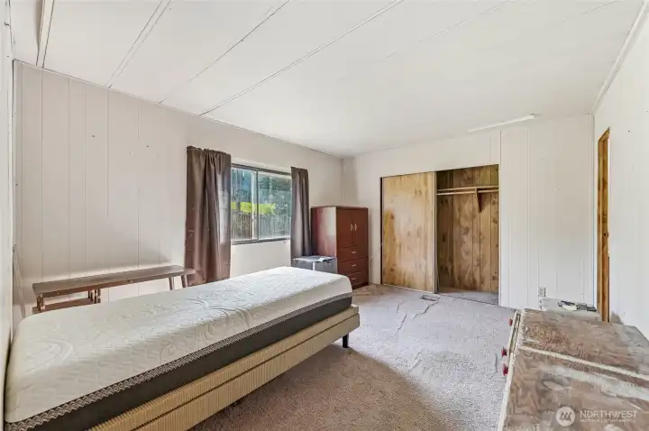 Primary bedroom. *All items shown in this room remain. *Notice the sagging in the ceiling in many areas.