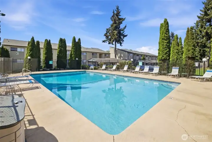 Just in time for summer!  Outdoor pool is just steps away from back patio