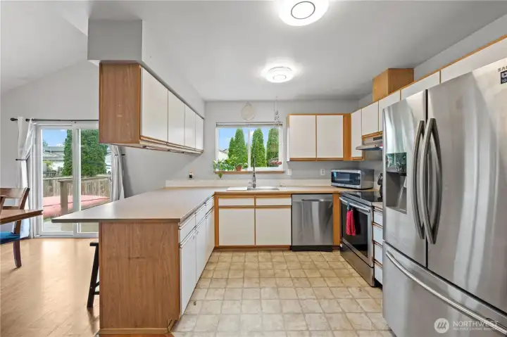 Prep, serve, and socialize with a kitchen that opens seamlessly to the dining area.