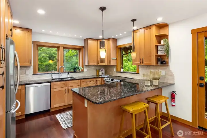 Spacious kitchen with abundant cabinetry, generous prep space, and room to gather.