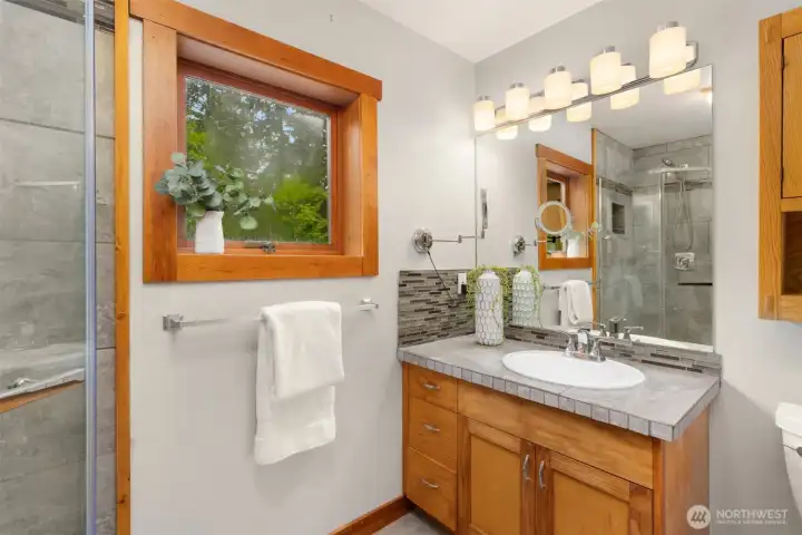 Updated bath with functional layout and timeless finishes.