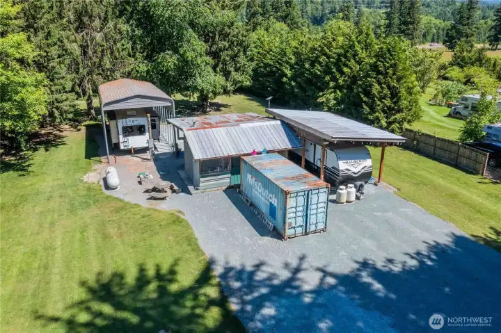 The building between the RV's is on a slab it could be improved will be sold in "as is" condition