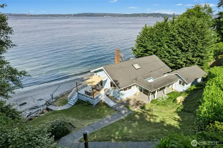 Elevated perspective highlighting the home's inviting footprint and attached studio space.