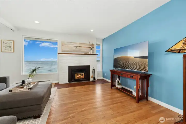 Oak hardwood floors flow throughout the home, adding warmth, character, and timeless appeal.