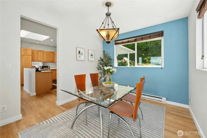 Thoughtfully positioned between the livingroom and kitchen, this dining room stays connected while distinct.