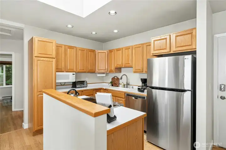 The thoughtfully designed kitchen offers an easy flow to dining and living areas.