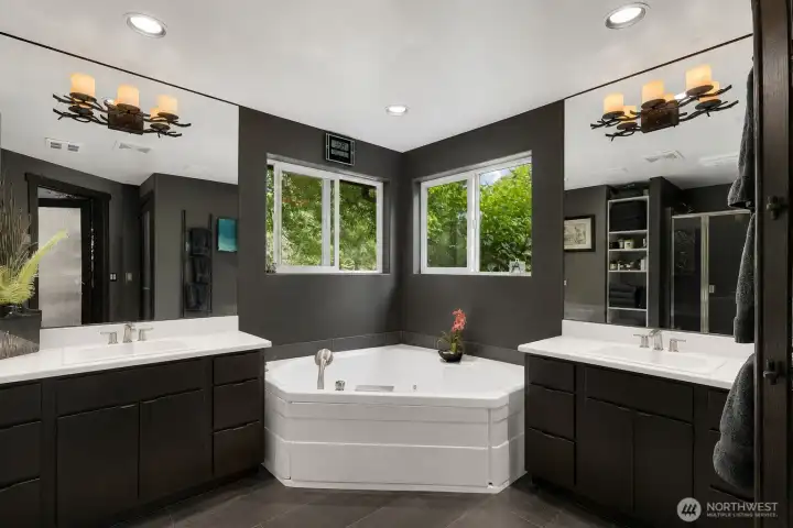 Newly remodeled primary bathroom. Larger windows currently being installed.