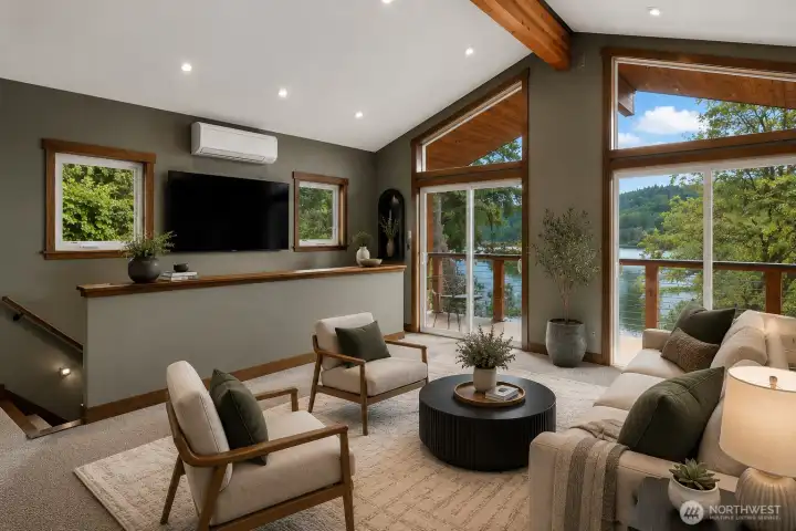 Virtually staged bonus room above the two car garage.