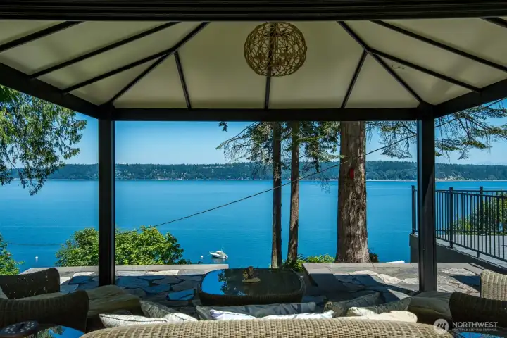 Large covered cabana overlooking Port Susan Bay, offering the perfect space to relax year-round while watching whales, bald eagles, and boats pass by.