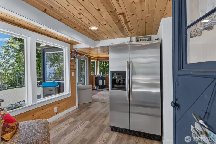 Walk-in to this beautiful LVP flooring, stainless steel appliances and expansive windows.