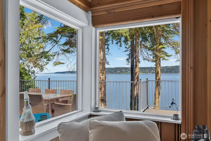 Every seat comes with a view in this light-filled living space.