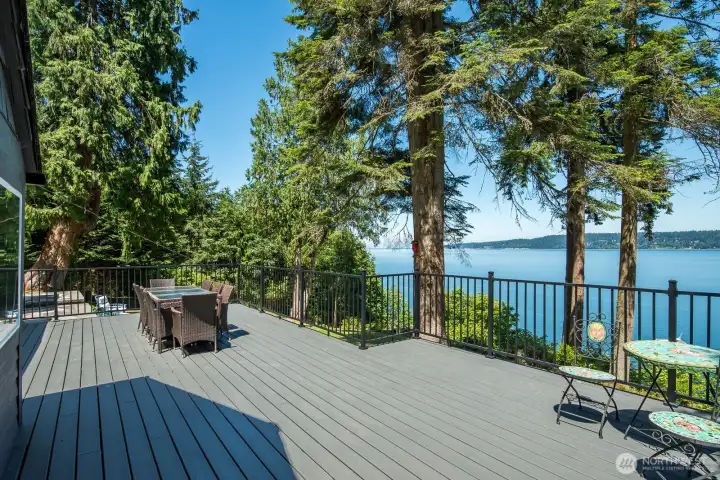 The oversized deck creates an incredible outdoor entertaining space, complete with panoramic water views and peaceful island surroundings.