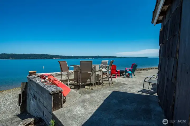 Enjoy effortless waterfront living with a beachside patio just steps from the shoreline and your private beach access.