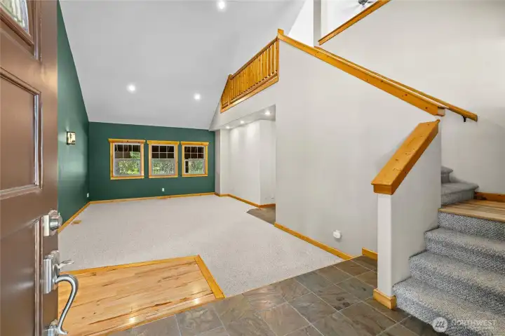 Inviting living room at off front entrance. All living space is upstairs. Inviting living room at off front entrance. All living space is upstairs.