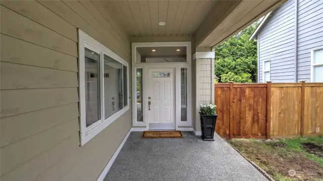 The home has a very useful porch and entry that is covered keeping you dry from any rain.  A fully fenced backyard with excellent privacy.  Wood siding and a 4 1/2-year young composition roof.  The windows are also approximately 4 1/2-years young.  There is a 3-car garage with plenty of storage.