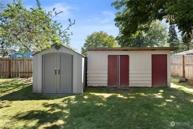 2 big sheds offer plenty of space for your tools and toys. The grey shed is only 1 year old