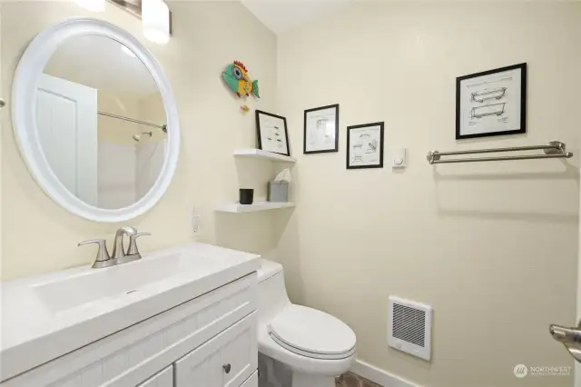 Bright and welcoming full bath...