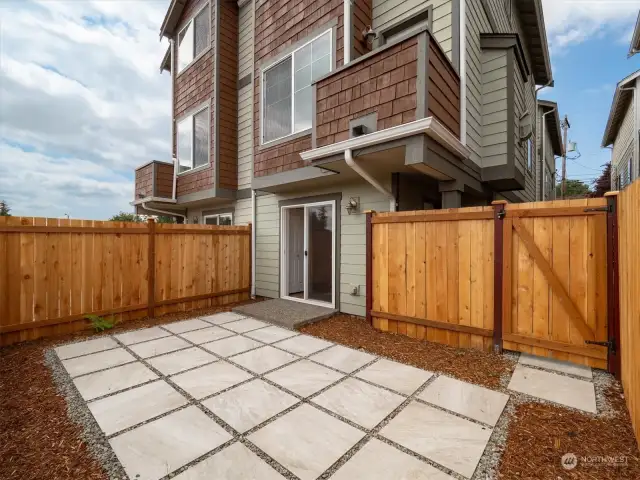 Private, low-maintenance, cozy patio, fully fenced. Photo shows Unit B (MLS 2276317) with reversed identical floor plan.