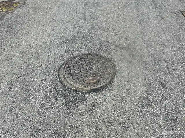 Sewer to West up street on 128th St E