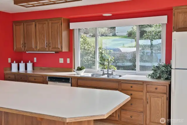 Large kitchen window faces south.