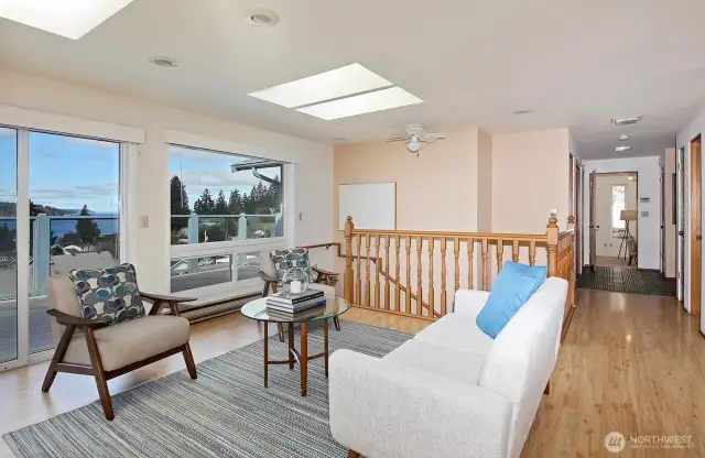 The Hallway leads to the bedrooms, bath, and family room.