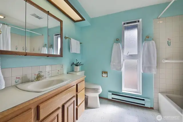 Main floor bathroom is a minty green, makes you want to brush your teeth.