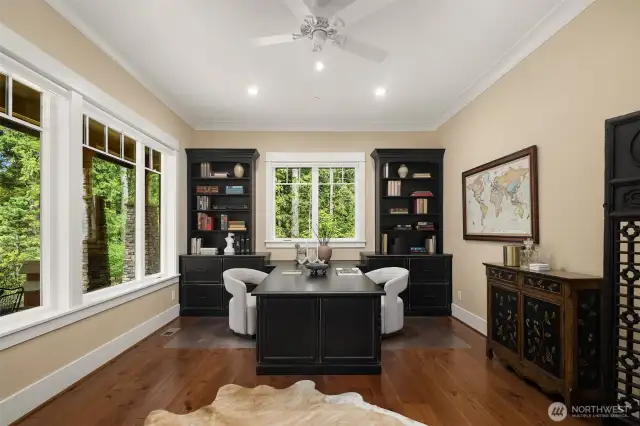 First of 2 Den spaces on the main level.  This one features built in double desk with custom cabinetry.