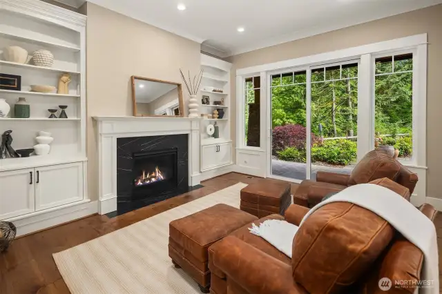 2nd Den on the main level or a "Snug Room" with gas fireplace and built in shelving.