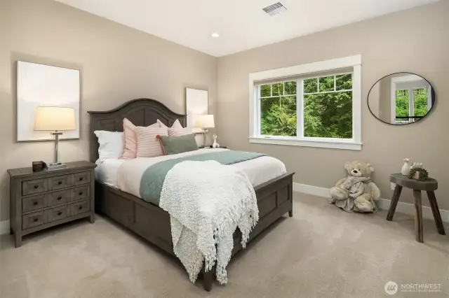 Guest bedroom #2 on the upper level with ensuite Jack and Jill bath.