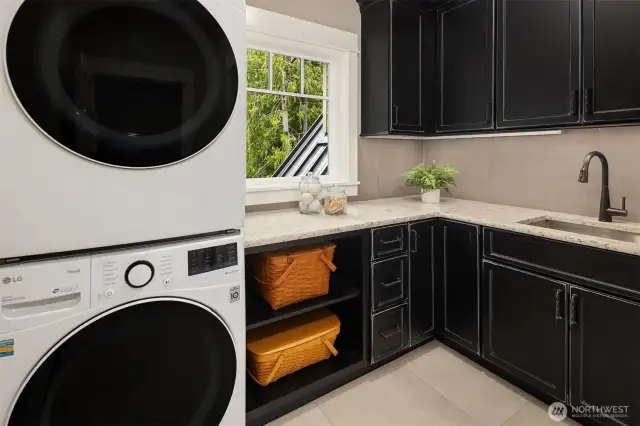 Upper level laundry with large walk in closet.  This is one of 2 laundry rooms.