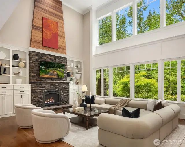 Soaring ceilings with dramatic windows overlooking the spectacular grounds.