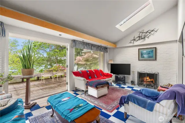 Bright, airy family room off kitchen