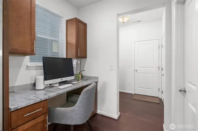 The kitchen command center is a bonus! It's a built-in work-from-home space, homework station, or household management hub conveniently nestled between the kitchen and mudroom leading to the garage!