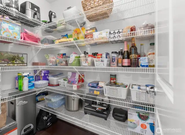 The walk-in pantry offers additional storage space!