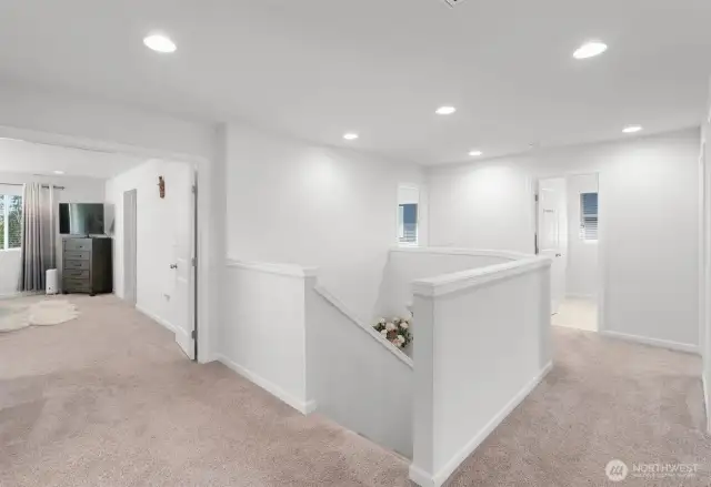 Upstairs you'll find a bright and open landing with French doors leading to the Primary Suite + 3 additional bedrooms, a bonus room, and laundry room!