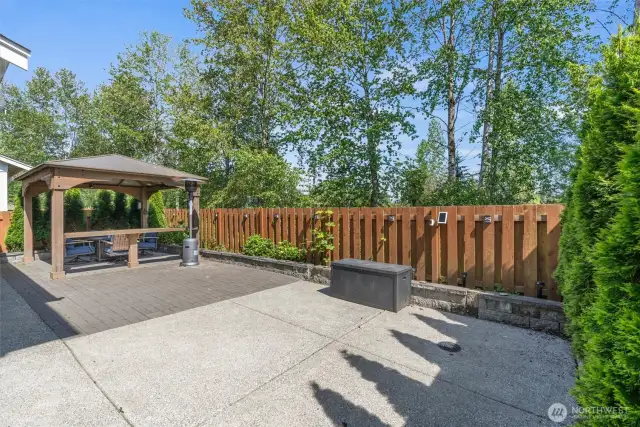Welcome to your private backyard oasis! Fully fenced, low maintenance outdoor entertainment space surrounded by beautiful nature!