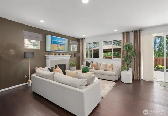 A cozy gas fireplace, designer-inspired paint and window coverings are featured in the main living areas!