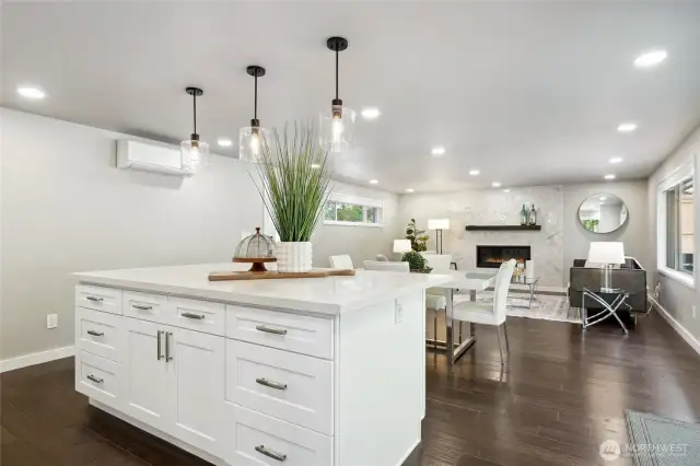 Center Island with low maintenance quartz countertops, breakfast bar and plenty of storage...